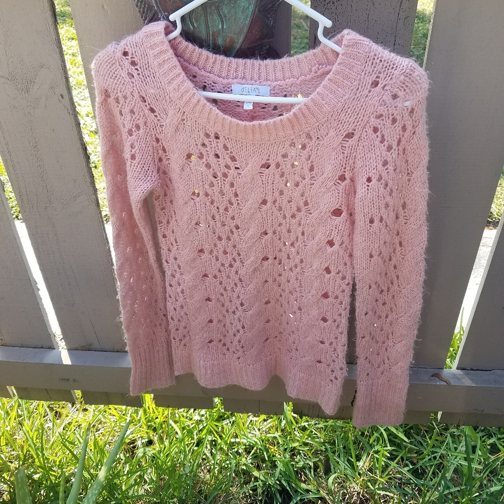 Pink and gold knitted wool sweater